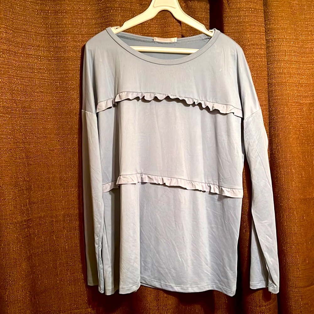 Women’s ruffle front blouse